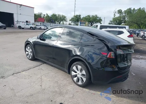 2023 Tesla Model Y Awd/Long Range Dual Motor All-Wheel Drive z USA, uszkodzony, nr VIN 7SAYGDEE2PA044328